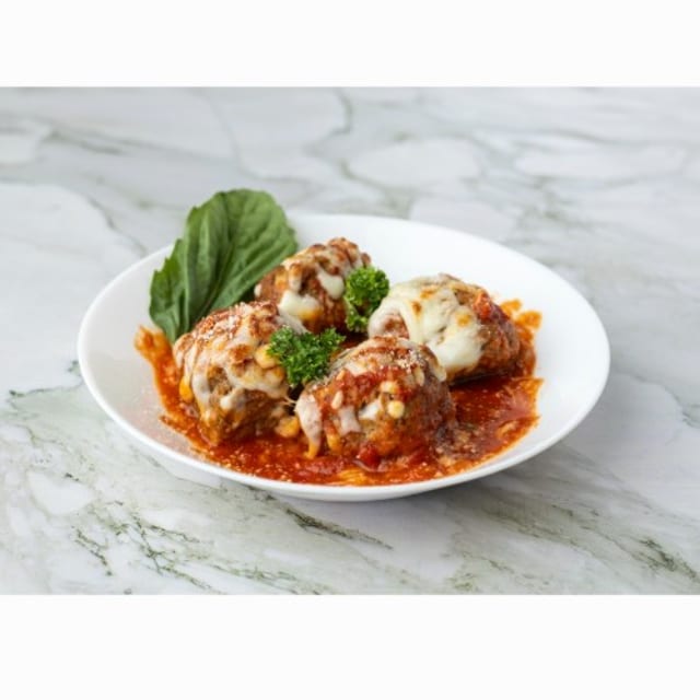 Baked meat balls with mozzarella.
